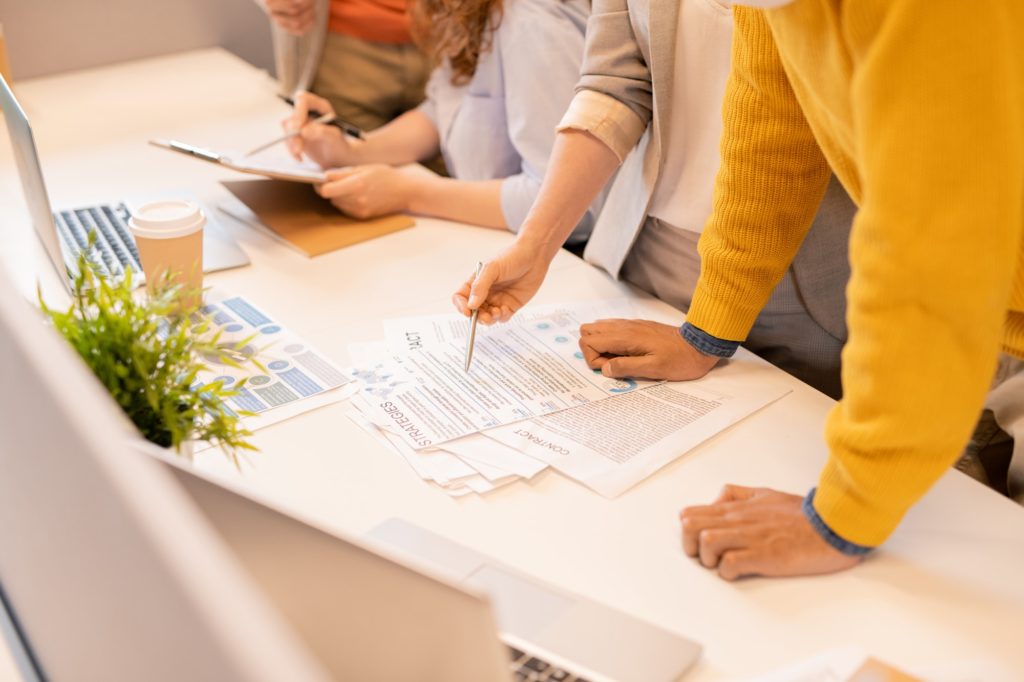 Examining business contract and report